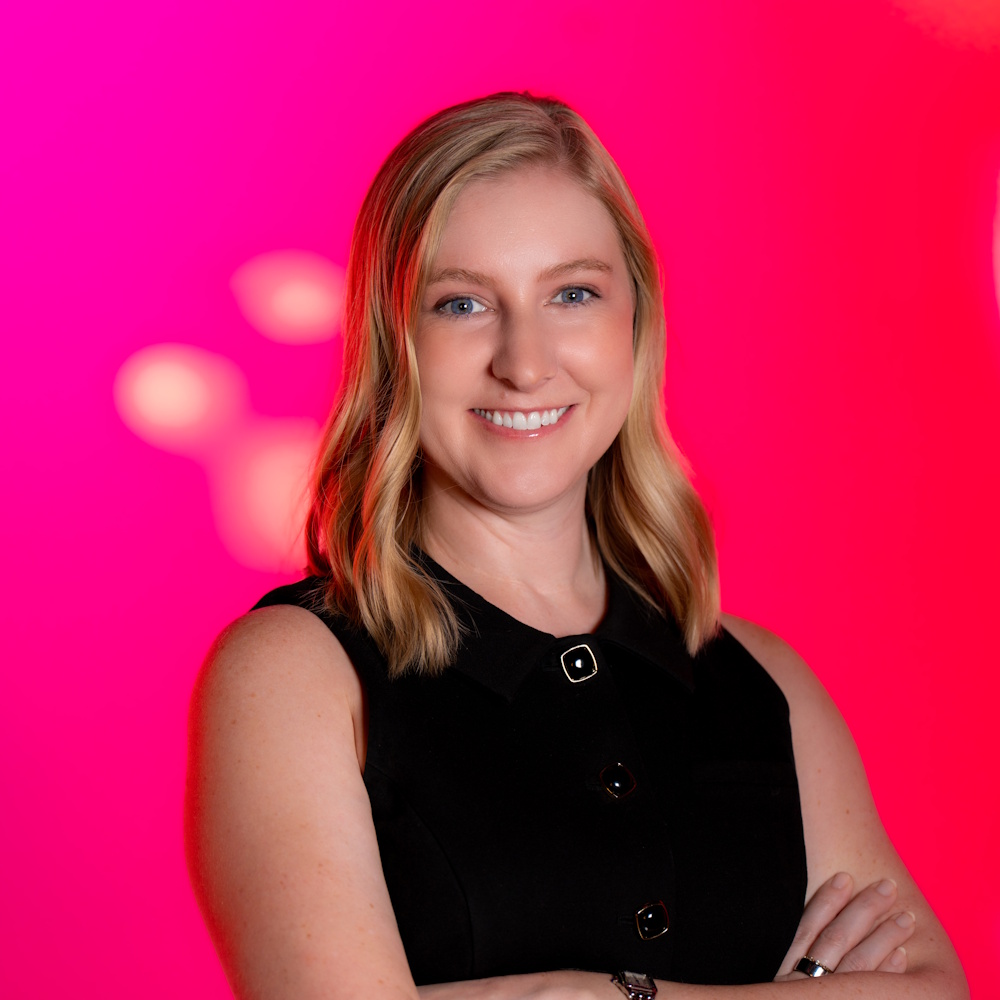 Robyn Overstreet standing, smiling at camera