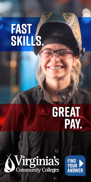 A woman wearing welding gear