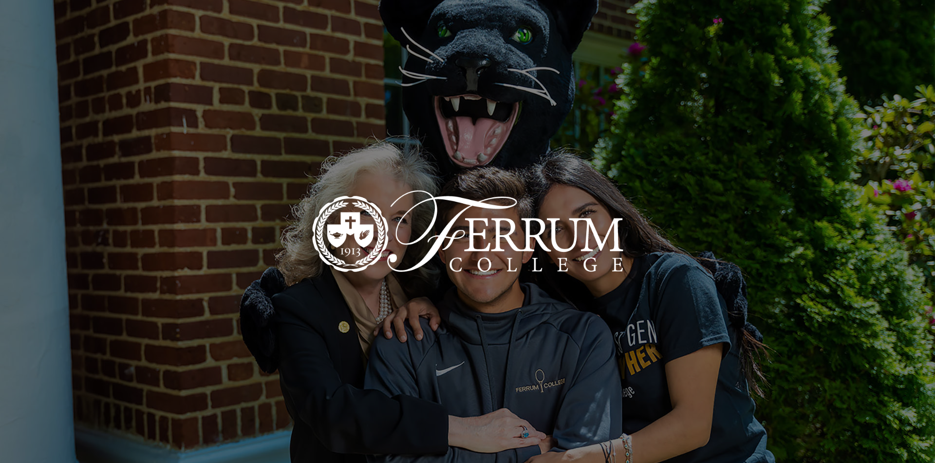 Dr. Martin, two students, and the Ferrum mascot