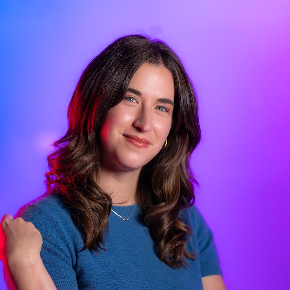 Emily Pilat standing, smiling at camera