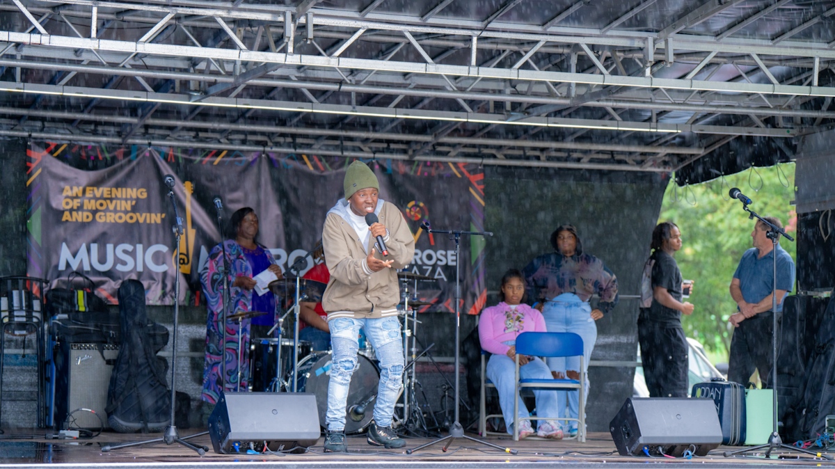 Singers performing on a stage