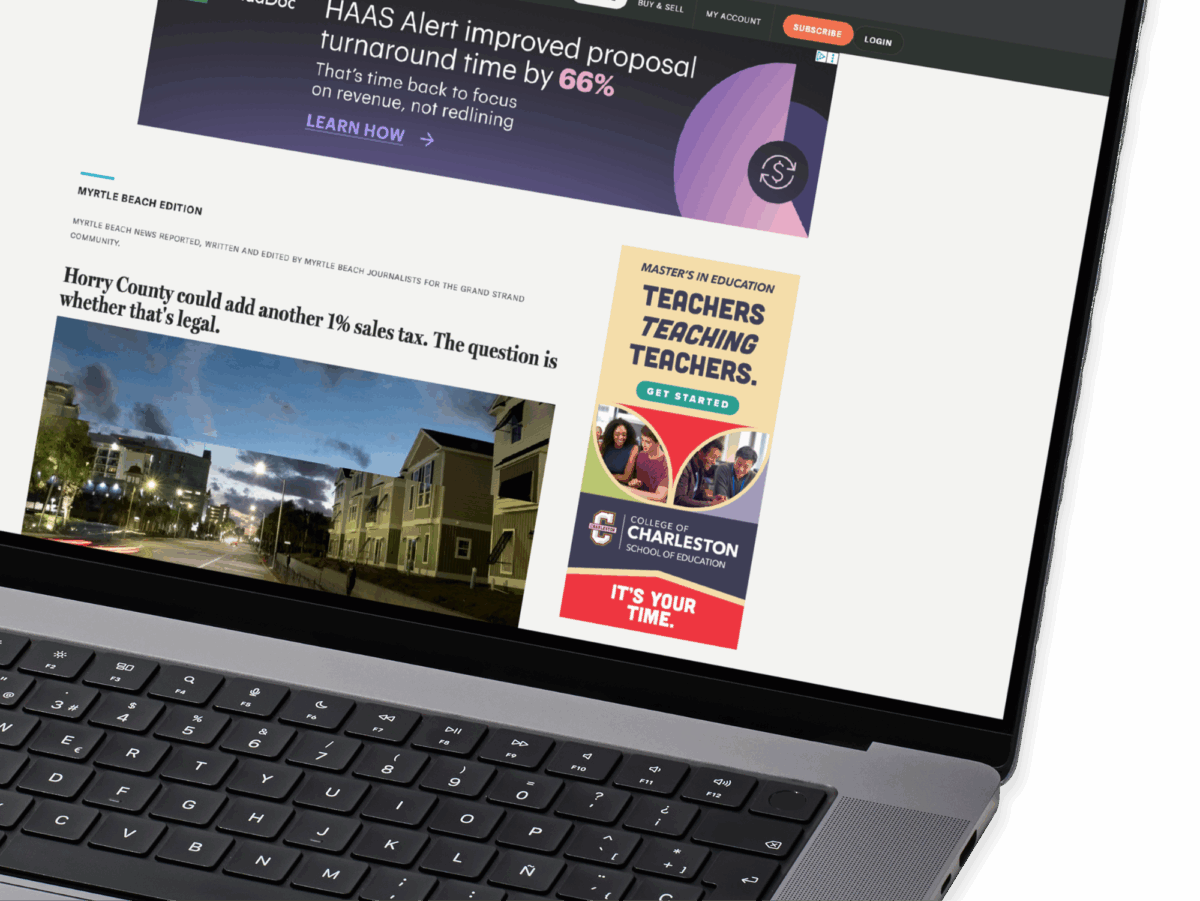 A laptop displaying a College of Charleston banner