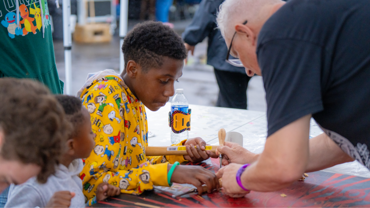 People working on art projects.