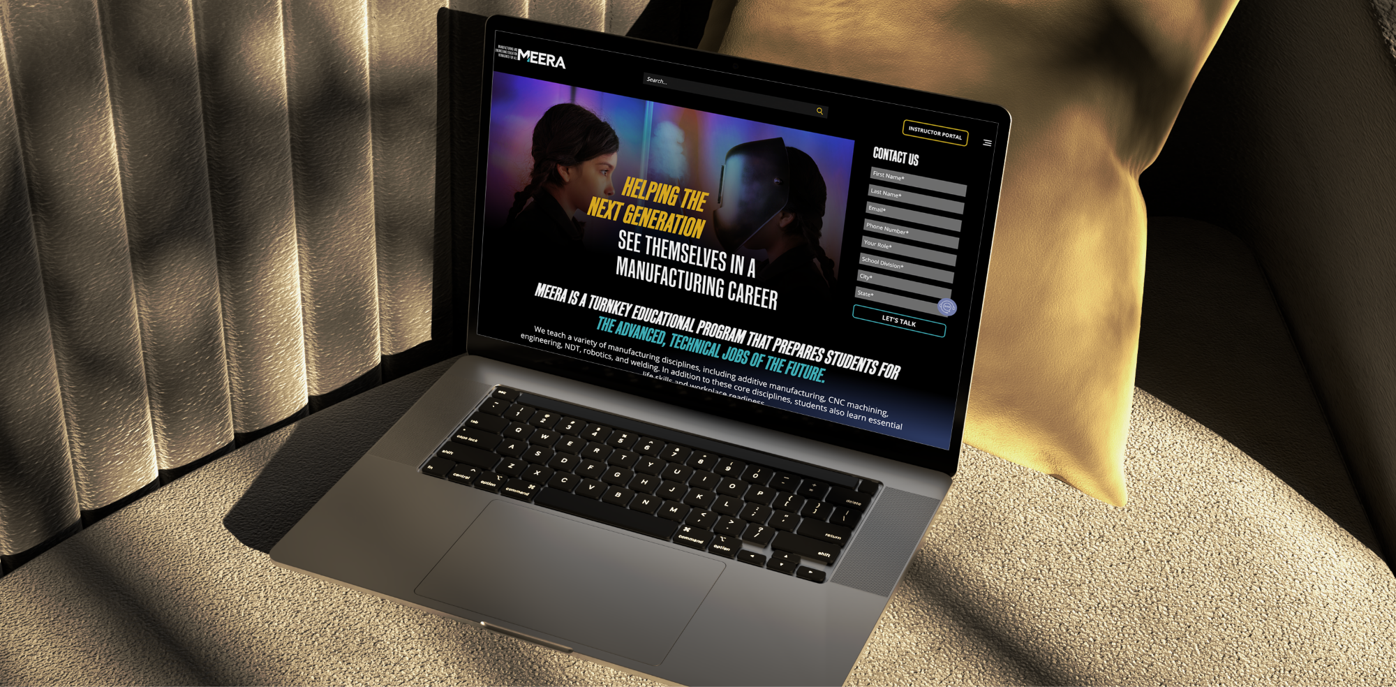 A laptop showing the MEERA Education website