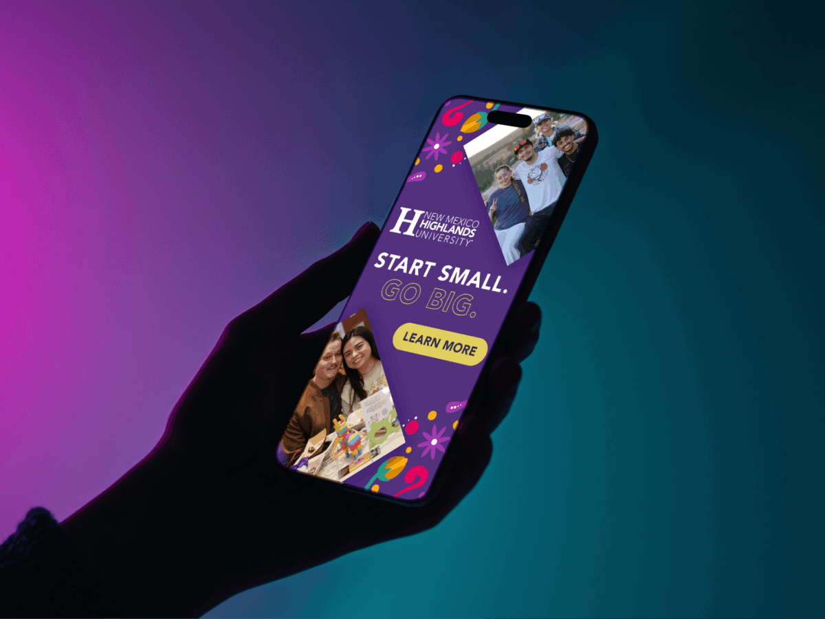 A smartphone showing the New Mexico Highlands University website