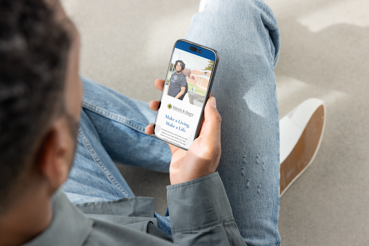 A smartphone showing the Patrick and Henry Community College website