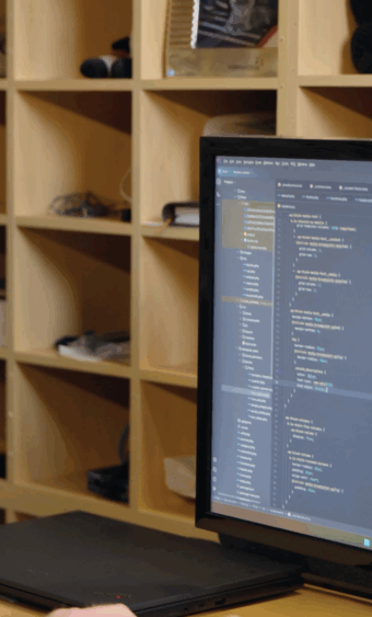 Closeup of a computer monitor with code on it.