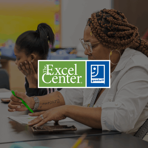 People seated at a series of tables