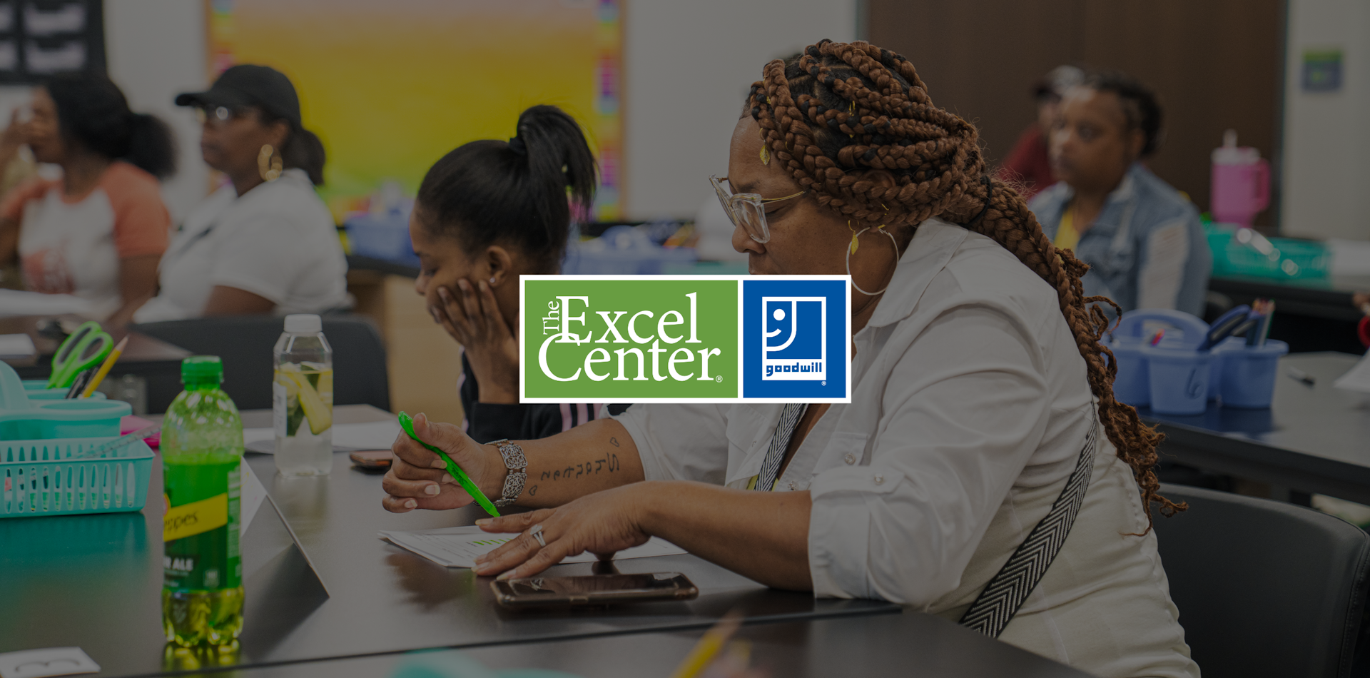 People seated at a series of tables