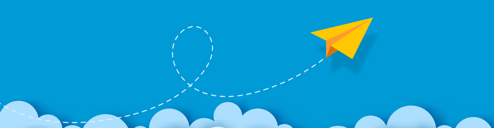 Yellow paper airplane flying through sky